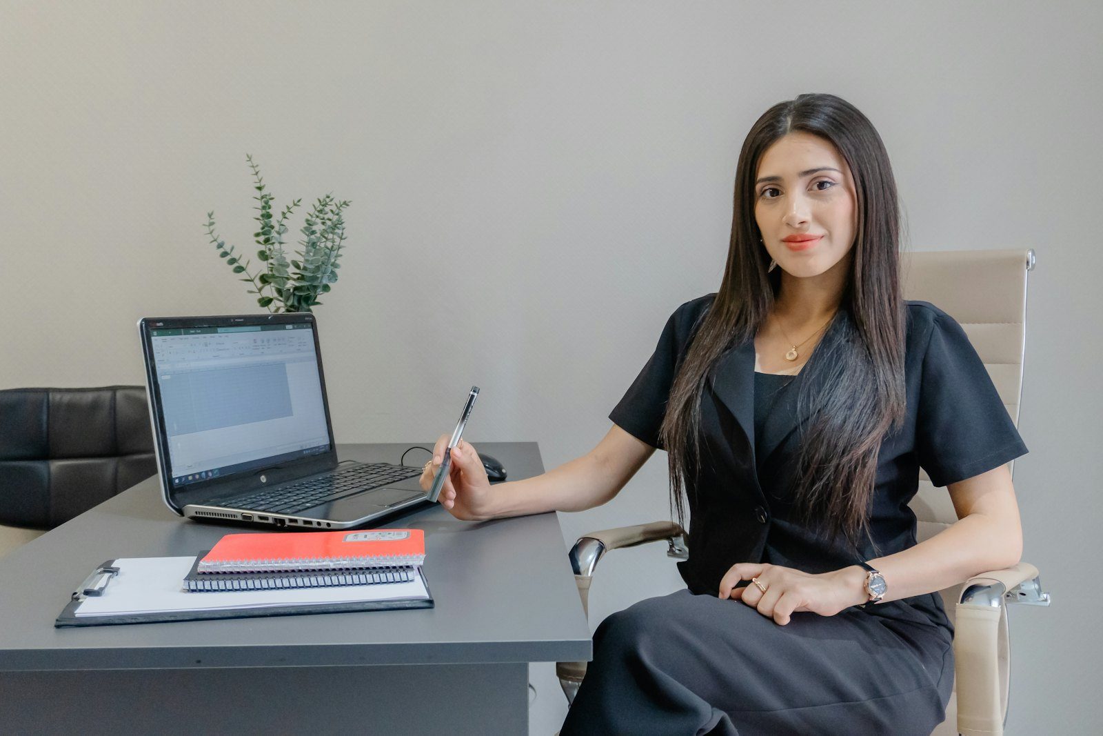 Web designer working on a website interface layout at a desk